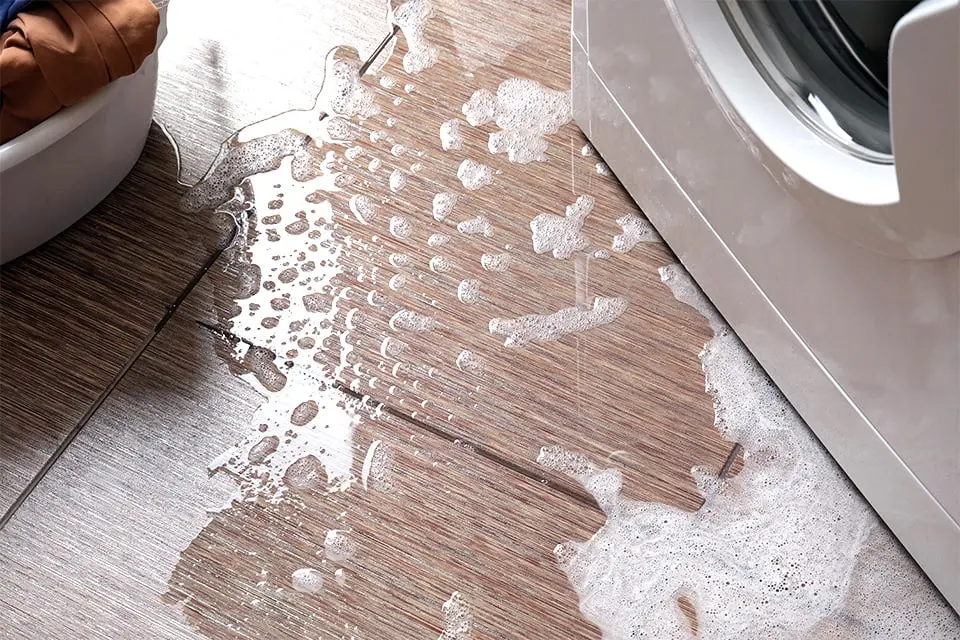 Laundry room floor with spilled water