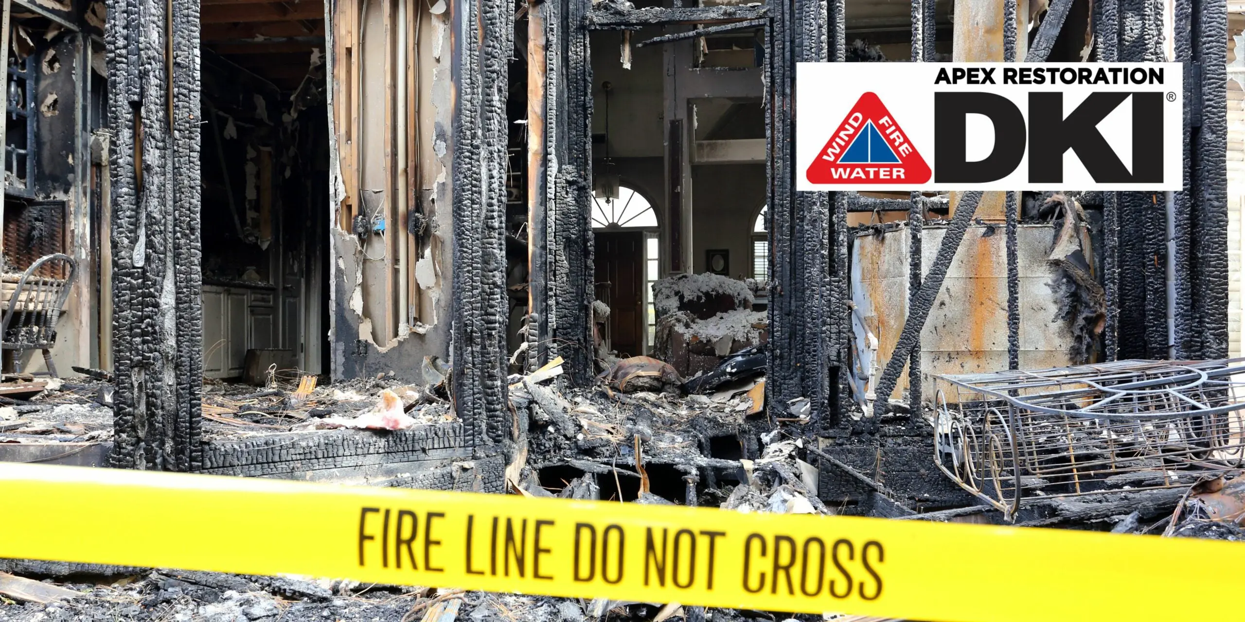 Fire-damaged building with caution tape