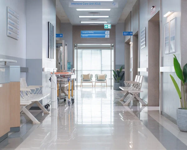 Hospital corridor with chairs and signs