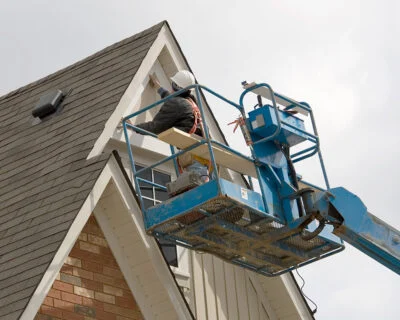 Construction worker on elevated platform