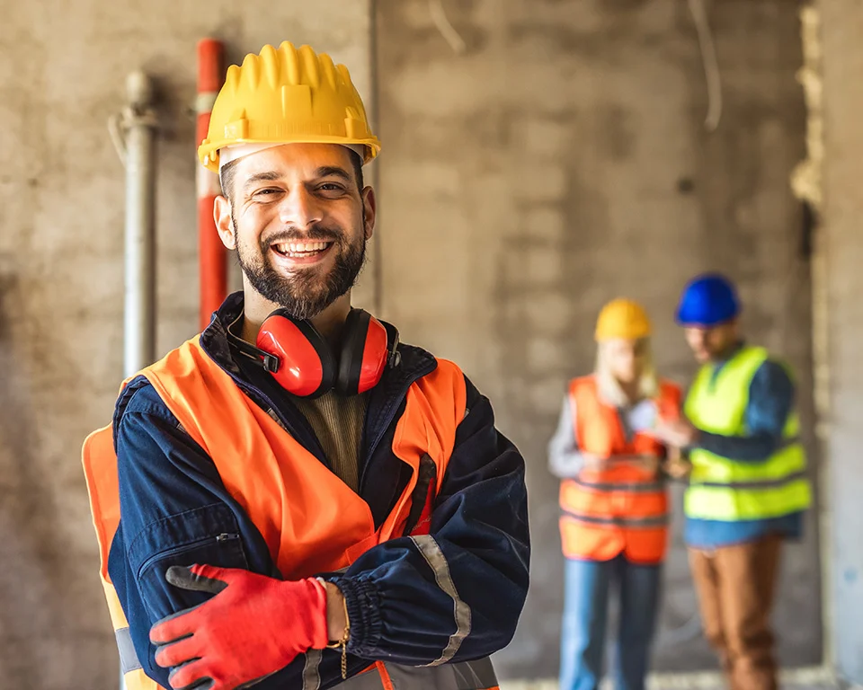 Worker with safety gear at construction